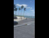 Two women same outfit tiktok dance on the street