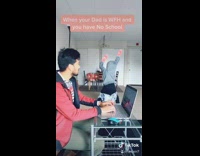 Kid dances distracts dad working home