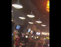 Guy blocks people playing arcade basketball 