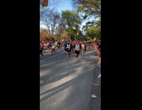 Guy drinks beer with friends during marathon