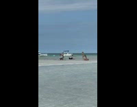 Different women bikini beach boat homeless joke