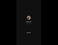 Lifted silver prius with huge tires and red wheels