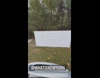 Recording of a sign to stop leaving gloves full of urine on lawn