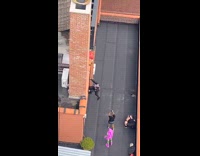 Guy poses in black spiderman costume 