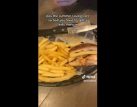 Ladies Split Burger and Fries Meal Between Themselves