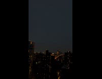 Collab WINY - Lightning on night sky over city buildings