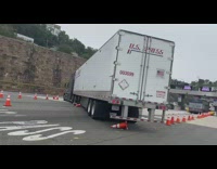 Big truck tries to make U turn on freeway 