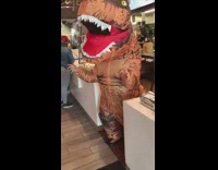 Person in dinosaur costume loud screeching scream