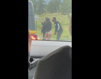 Three people tiktok dance while in traffic