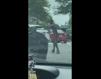 Spiderman direct car traffic at the intersection 