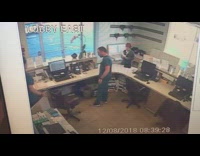 Nurse falls off chair at the front reception desk after colleague moves chair