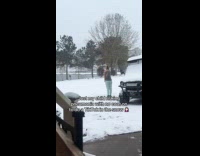 Woman selfie video outside the snowy yard