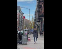 Guy dances on sidewalk 
