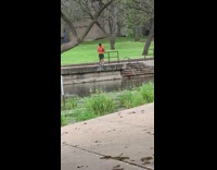 Collab IITW - Man selfie sleeveless orange shirt river