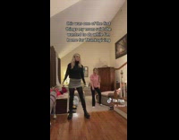 Girl dances with mom while shes home for thanksgiving