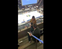 Woman yellow jacket cap basketball bleachers pictorial