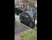 Red shirt guy black jeep middle street 