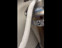 Submitter removing ice formed liquid nitrogen on hose