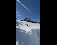 Snowboarder falls forward when landing incorrectly off ramp