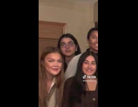 Group photo turns into pregnancy announcement 