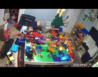 Woman trips over toys in play room