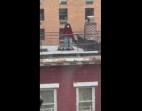 Woman red jacket face mask boots rooftop
