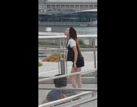 Black white shirt girl kisses air river