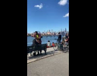 Collab WINY - Man cuts hair of woman at docks