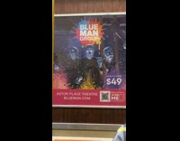 Googly eyes on Blue Man group poster 