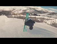 Guy wears suit and tie green skis 