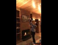 Girl holds black white puppy lion king 