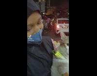 Fat cat holds treats with arms 