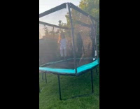 Young girl shadow play bounce on trampoline