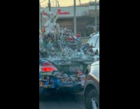 Custom car covered with random objects decoration