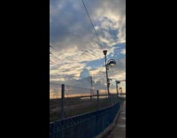 Submitter films clouds cast shadow on sky