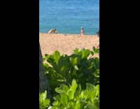 Two women in bikini tiktok dance at beach