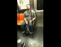 Guy sleeps mouth open on train and leans forward almost falls over