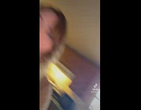 Woman eats hot wings