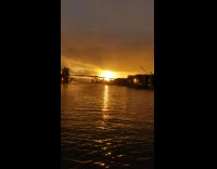 Bus pass by bridge sunset missing part illusion