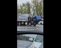 Front of dump truck leaning forward