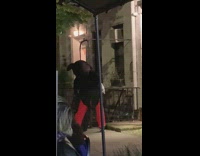 Mickey mouse costume person dances restaurant patio 