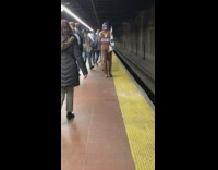 Person walks in NASCAR gear