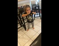 Little girl spits out sour candy mom