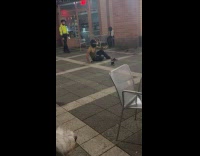 Man VR Goggles and controller at park