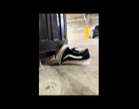 Man shooting shoe on trash bin and fails 