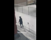 Man cowboy hat dance outside snow tripod