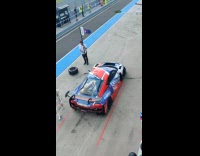 Photographer almost gets hit by race car 