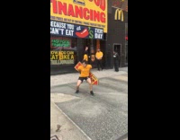 Man yellow shirt spin sign fast food financing