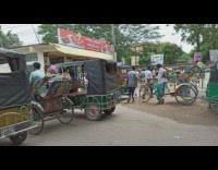 Timelapse busy street intersection bangladesh motorcyles bicycles