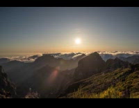 Time lapse video of clouds covers mountain